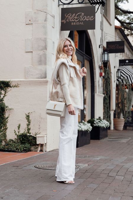 Winter white outfit 🤍 off white jeans, shearling vest 

#LTKstyletip #LTKSeasonal #LTKfindsunder100