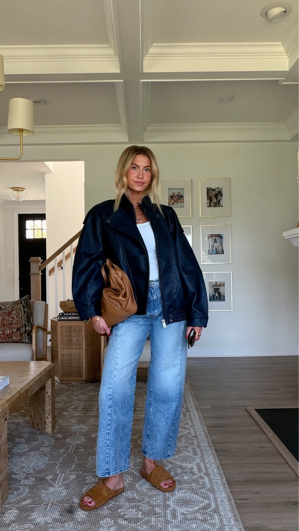 Loving this bomber to add a cool factor to a simple outfit. Bomber runs oversized, wearing a Medium, tank runs TTS wearing an XS long length, jeans run TTS

#LTKootd #LTKNYFW #LTKTravel