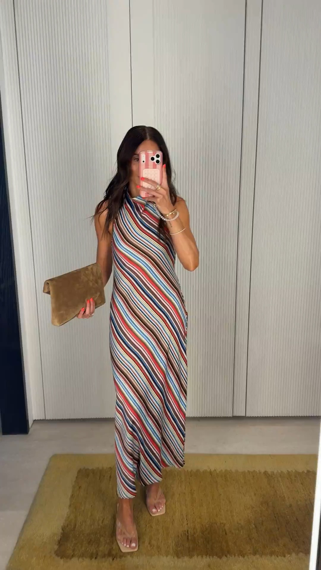 I'm wearing size XS.

A colorful satin halter dress is the perfect statement piece for summer vacations and special occasions.

midi dress, satin dress, vacation outfit, summer dress, colorful striped dress, wedding guest outfit, beach vacation style, resort wear outfit, vacation dinner look, summer occasion dress

#LTKOver40 #LTKWedding