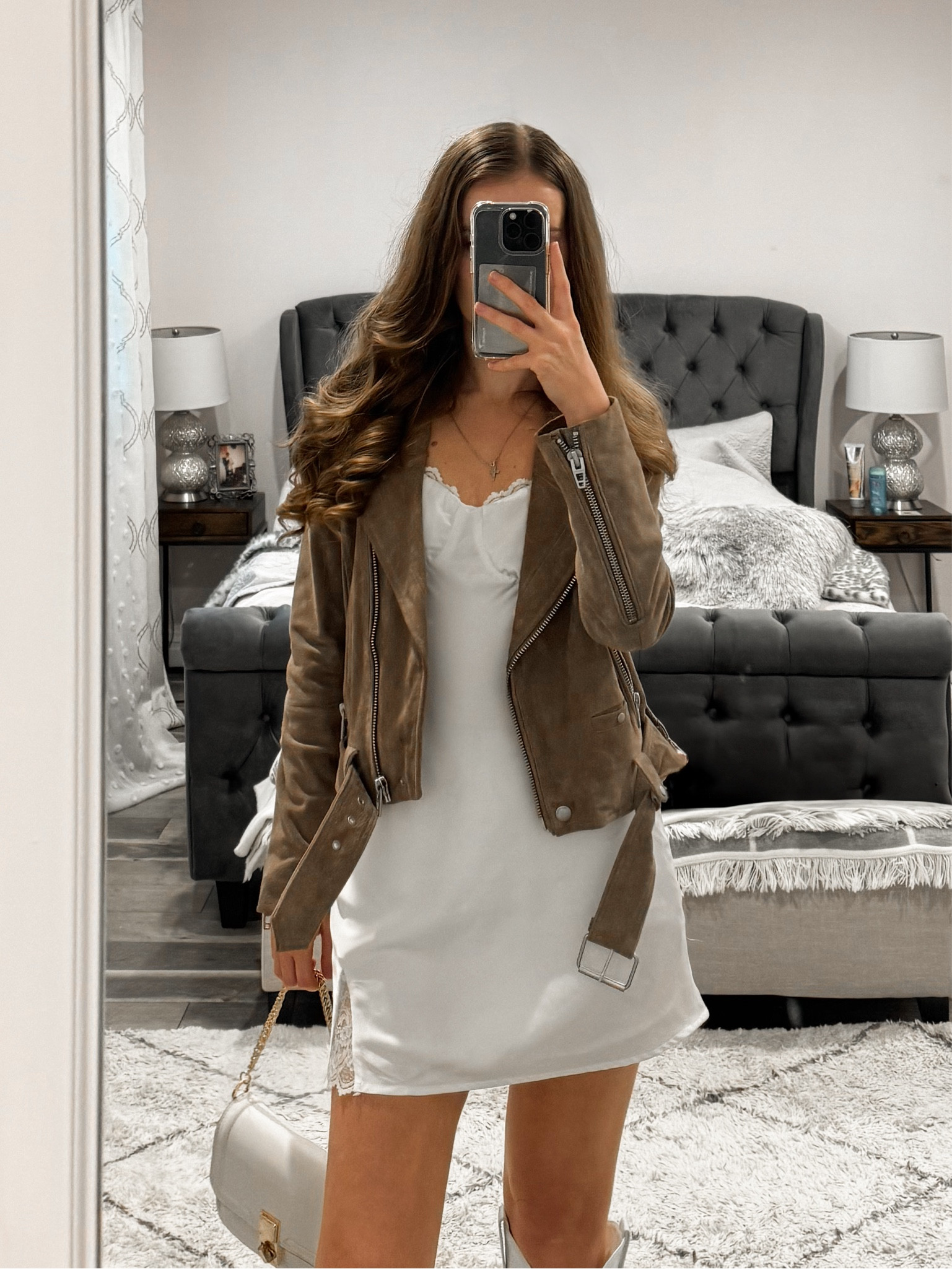 This suede moto jacket paired with a white mini dress, suede boots, and a crossbody bag is perfect for country concerts, or a going out outfit. 
.
.
.
.
.
.

Suede jacket | brown jacket | concert outfit | casual jacket | dress and boots | slip dress outfits | white dress outfit | western outfit | suede bag | outfit ideas | outfit inspo | Nashville outfits | mini dress outfit | country concert outfit 

#LTKSeasonal #LTKU #LTKSaleAlert #LTKGiftGuide #LTKWorkwear #LTKTravel #LTKShoeCrush #LTKItBag #LTKParties

#LTKStyleTip #LTKFindsUnder50 #LTKFindsUnder100