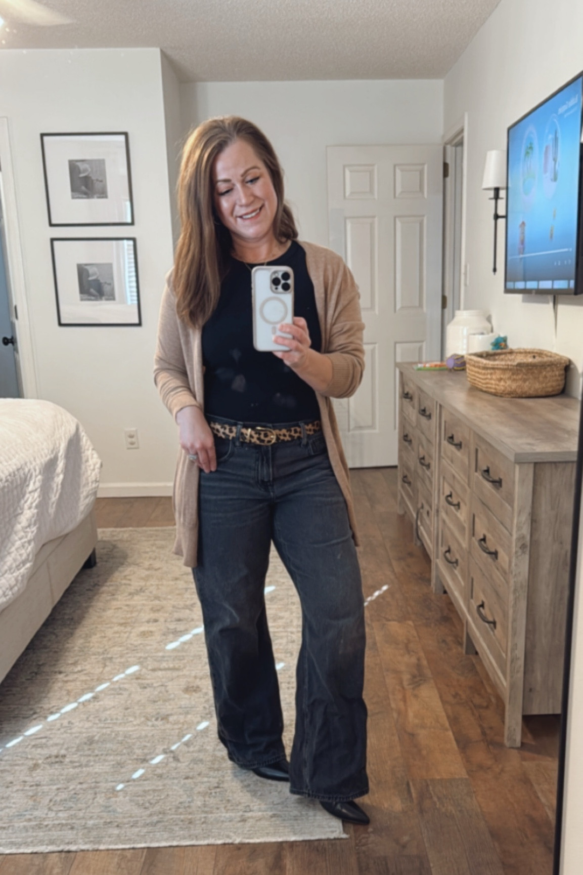 Winter outfit idea 

Cardigan 
Top
Jeans 
Leopard belt 
Kitten heel booties 

#LTKShoeCrush #LTKOver40 #LTKSeasonal