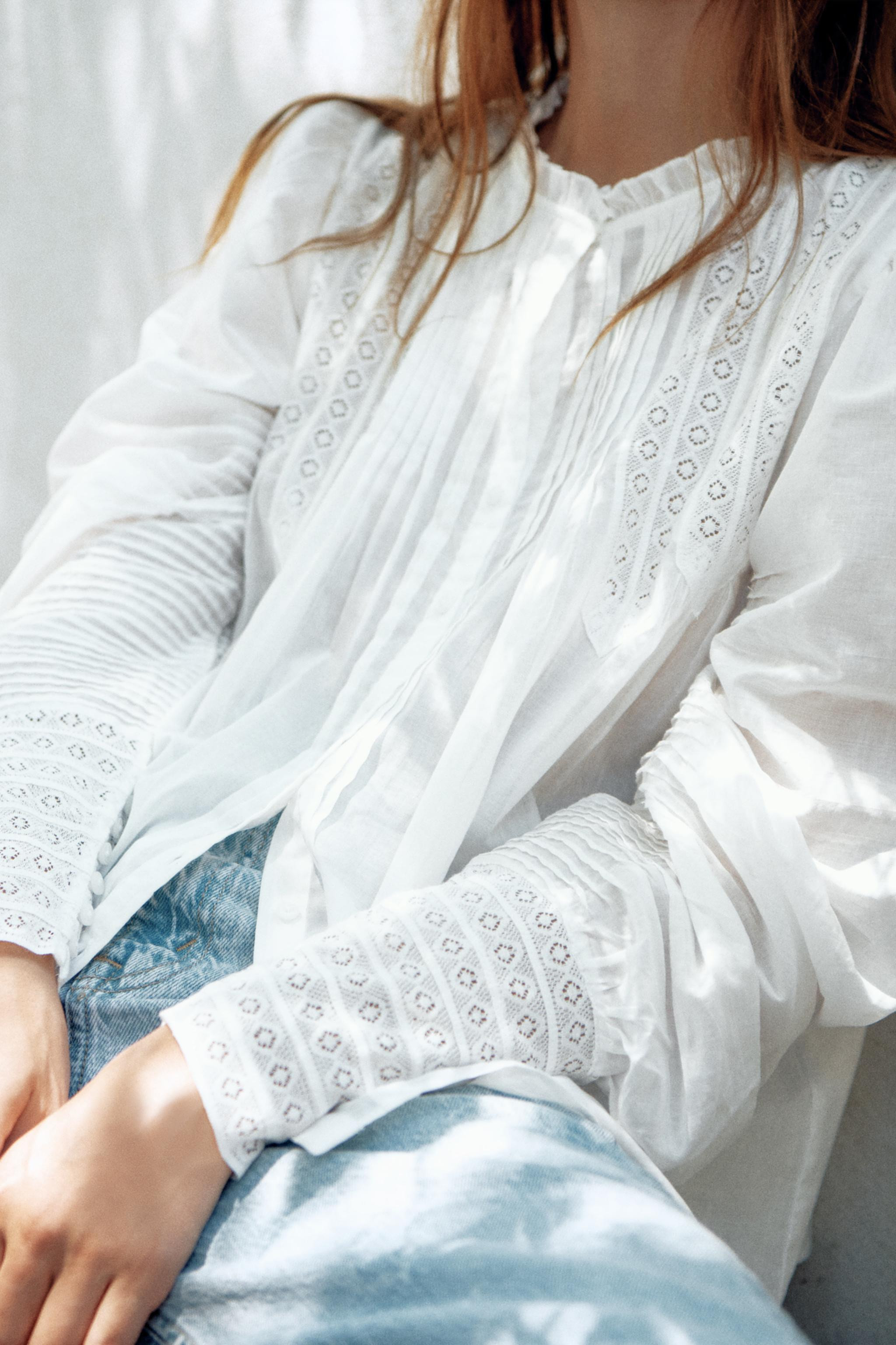 ZARA WOMAN COLLECTIONShirt made from cotton yarn. Round neck and long puff sleeves with cuffs. To... | Zara US