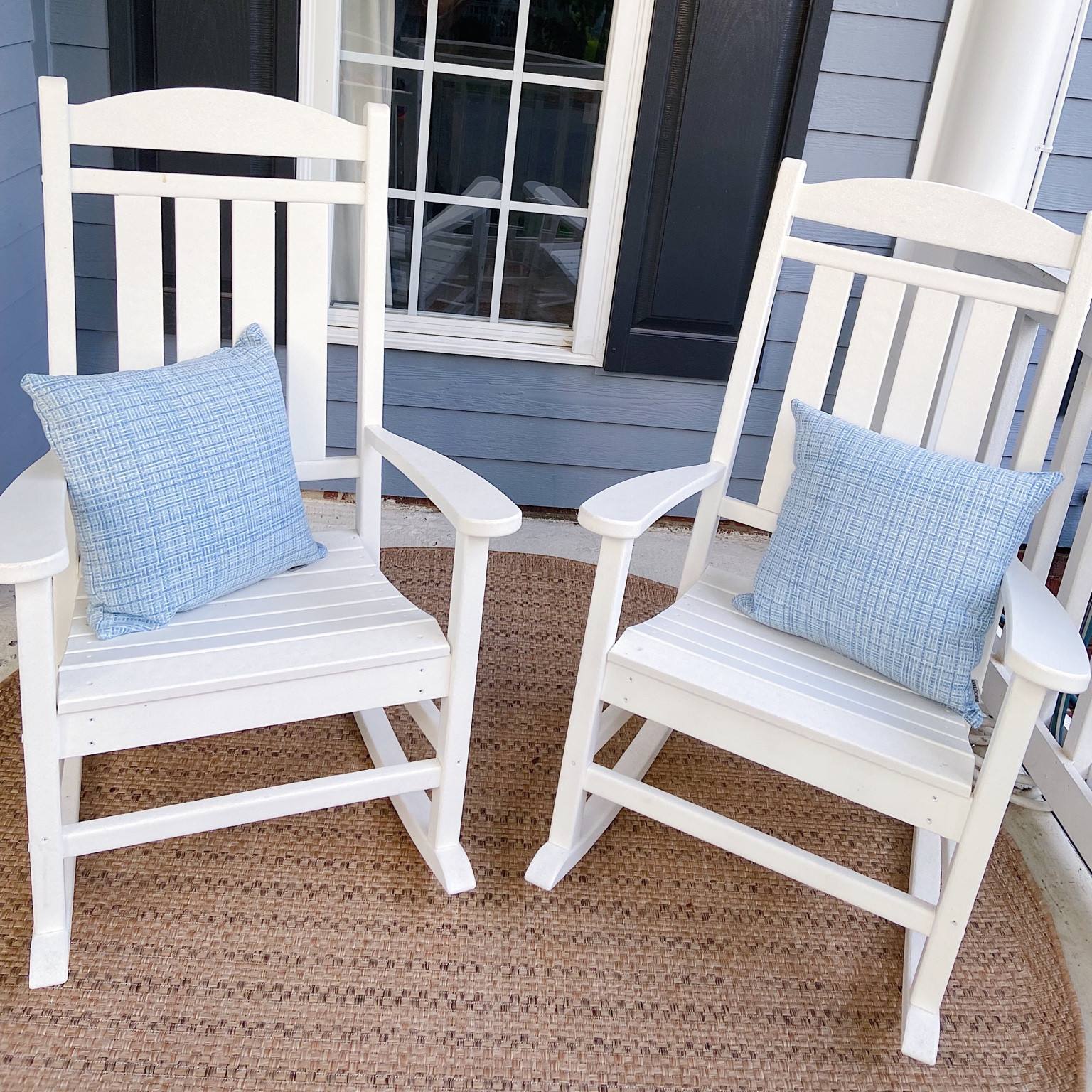 Front porch rocking chairs. There plastic so they’re easy to clean and won’t require any painting. Outdoor pillows are an Amazon find. | blue outdoor pillows | front porch decor | outdoor rocking chair | outdoor furniture | outdoor rug 

#LTKsalealert #LTKSeasonal #LTKhome