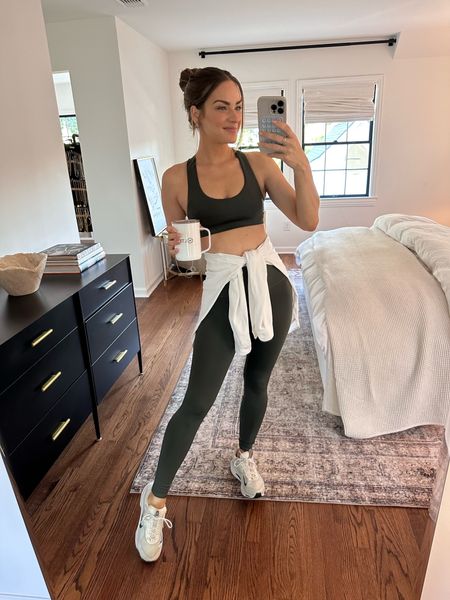 Loving this dark green activewear set & the fit is so darn cute! I'm wearing a size S in both. My sneakers fit TTS. // Alo yoga, activewear set, workout outfit, fall activewear 