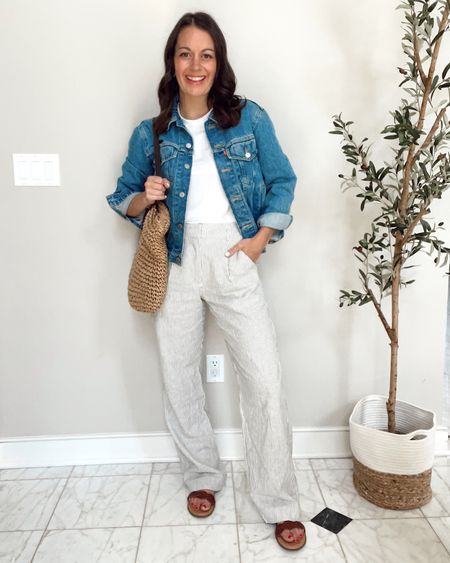 Teacher outfit idea with these Old Navy linen trouser pants - they run true to size to a tad small.  Paired it with a white tee (Tts) and a jean jacket (Tts).  

Spring outfit, workwear, linen pants, trouser pants, pleated pants

#LTKunder50 #LTKworkwear #LTKSeasonal