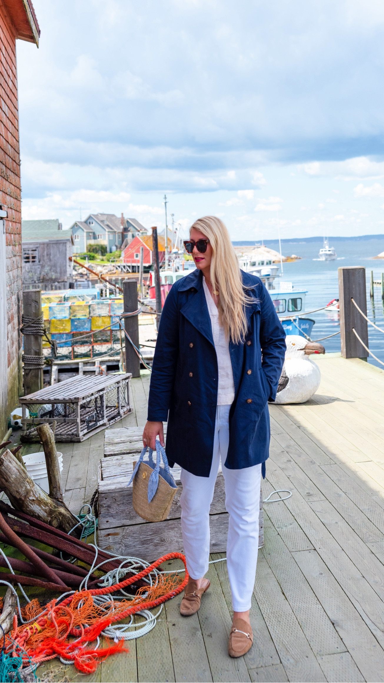 Coastal vibes with this navy trench coat, white loose fit jeans, linen tan top, seersucker wrapped tote

#LTKOver40 #LTKSaleAlert #LTKTravel