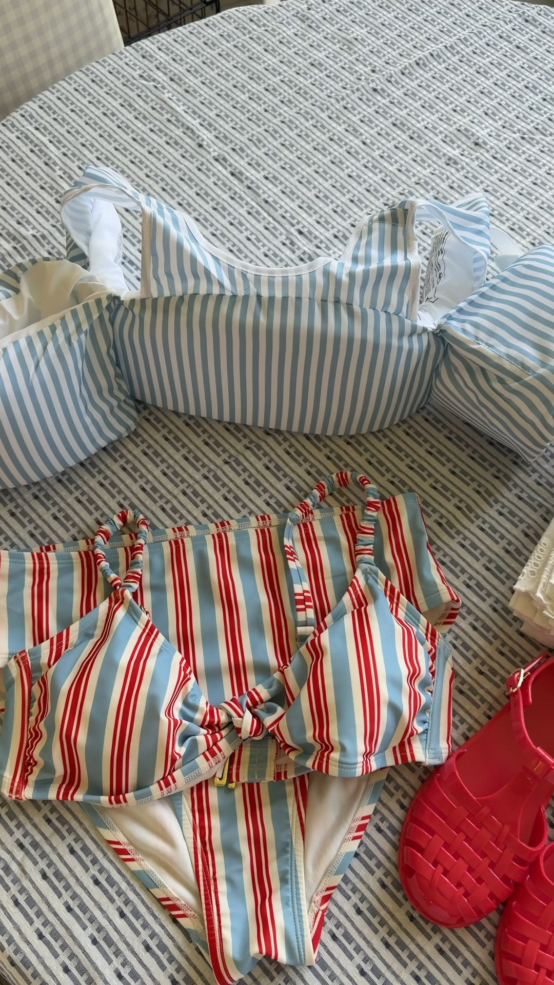 Walmart finds! Women’s 4th of July swimsuit, boys puddle jumper, girls jellies, eyelet tablecloth, raffia flower napkin rings!