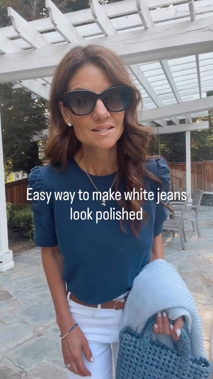 Here's what I'm wearing to happy hour. The white jeans fit true to size. I am 5'7" tall and wearing a size 26. I usually wear a 25 or 26. The Navy top has a cute sleeve. It is available in other colors. I am in a size small love the denim bag and cute jewelry to add to the look.

#LTKootd #LTKOver40 #LTKWorkwear