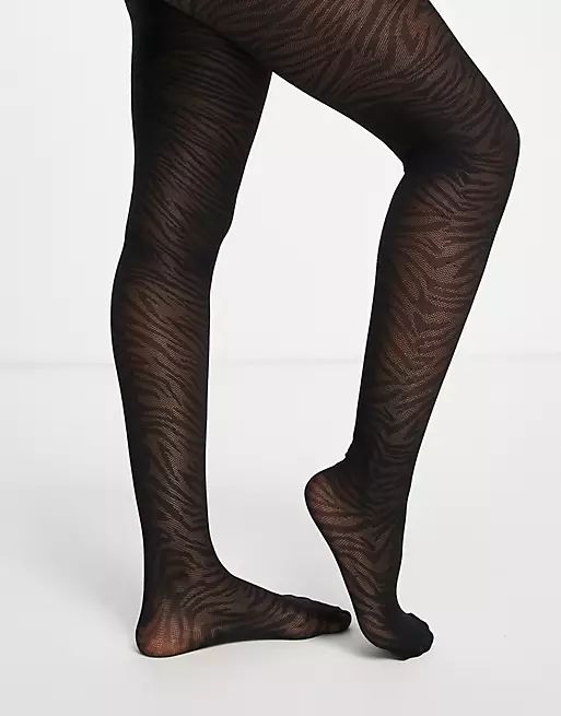 ASOS DESIGN 30 denier zebra print tights in black | ASOS (Global)