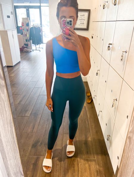 Lululemon align one shoulder sports bra (sz 2). Lululemon align 23” (sz 0). Lululemon slide sandals (size up if you are a half size). Barre outfit. Yoga outfit. Activewear.

#LTKshoecrush #LTKunder100 #LTKfit