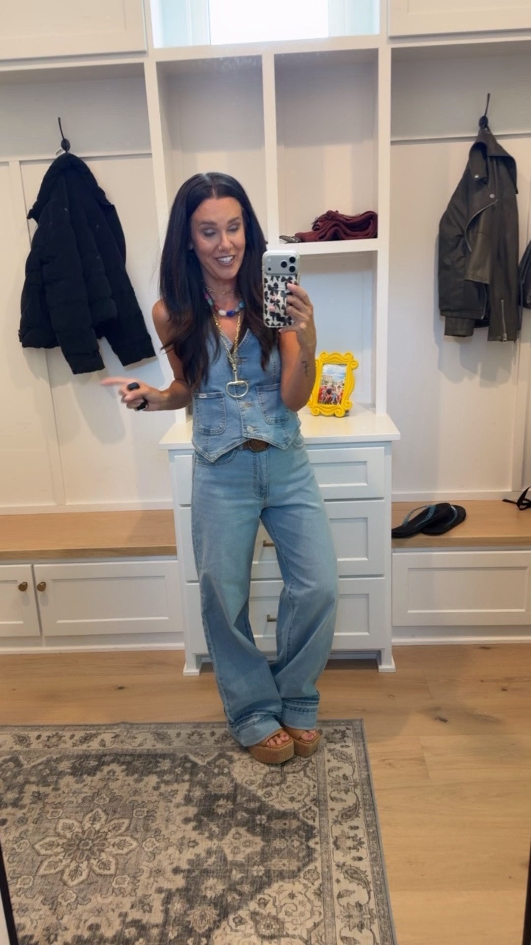 Wearing a small in the top and a 2 in the jeans