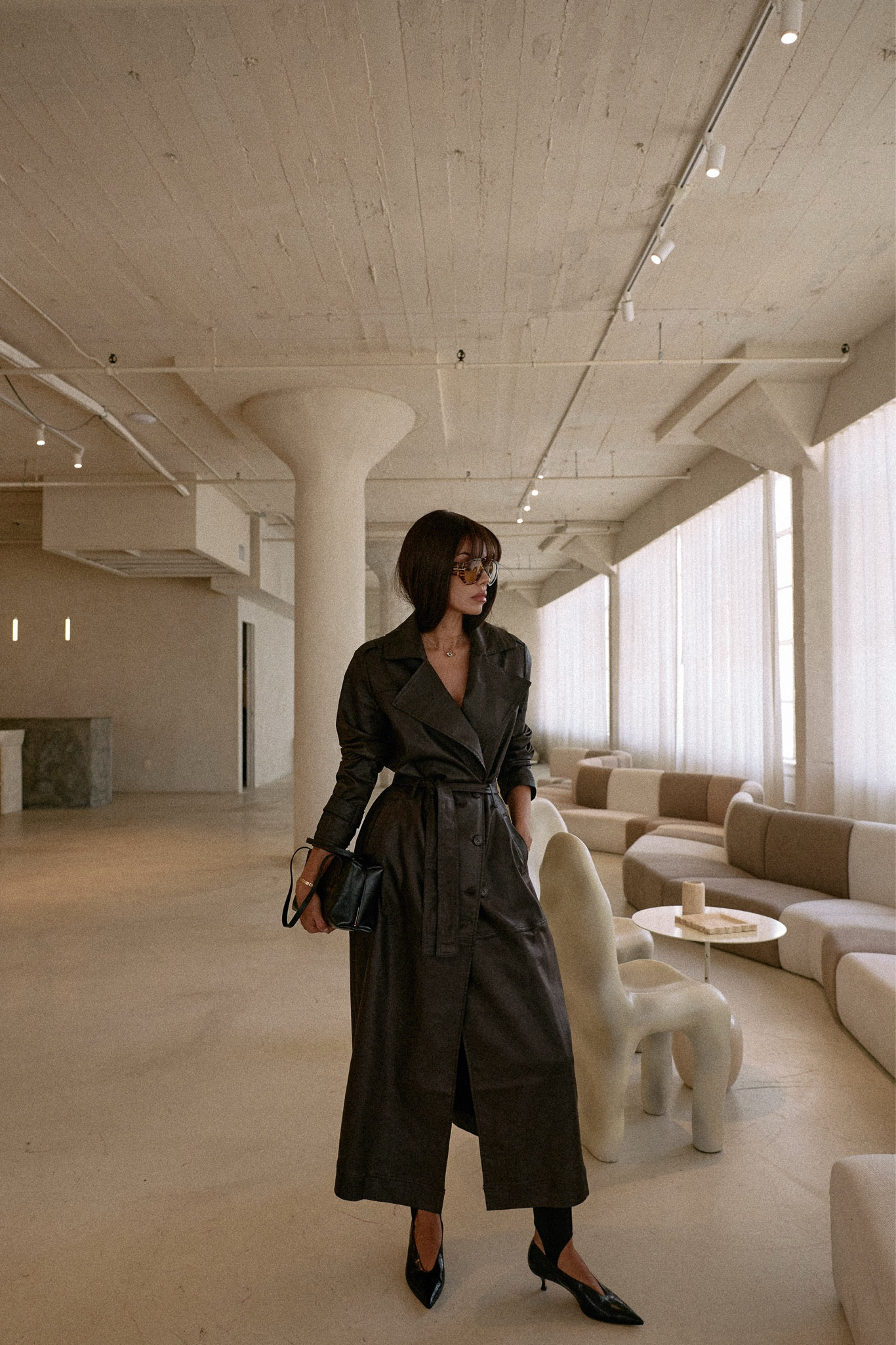 A very chic combo - super long trench coat in brown and black stirrup leggings 🤎🖤

#LTKWorkwear #LTKFindsUnder100 #LTKSaleAlert