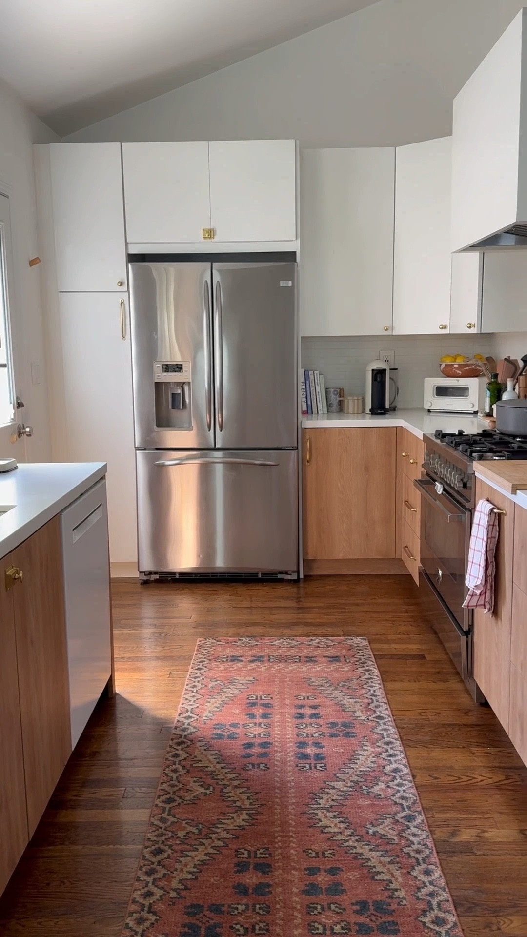 going to miss my little dream kitchen! 

over the years it went from dark and ugly to clean and modern to warm and cozy, i'm so happy with the little recent updates i did with things from @rejuvenation, we used the most stunning massey brass pulls, added cafe curtains and the brookside rail system above the stove and it made our kitchen finally feel like a grownup!! 

also side note, i'm reaaally gonna miss opening the drawers with my toes! 😭

#LTKHome