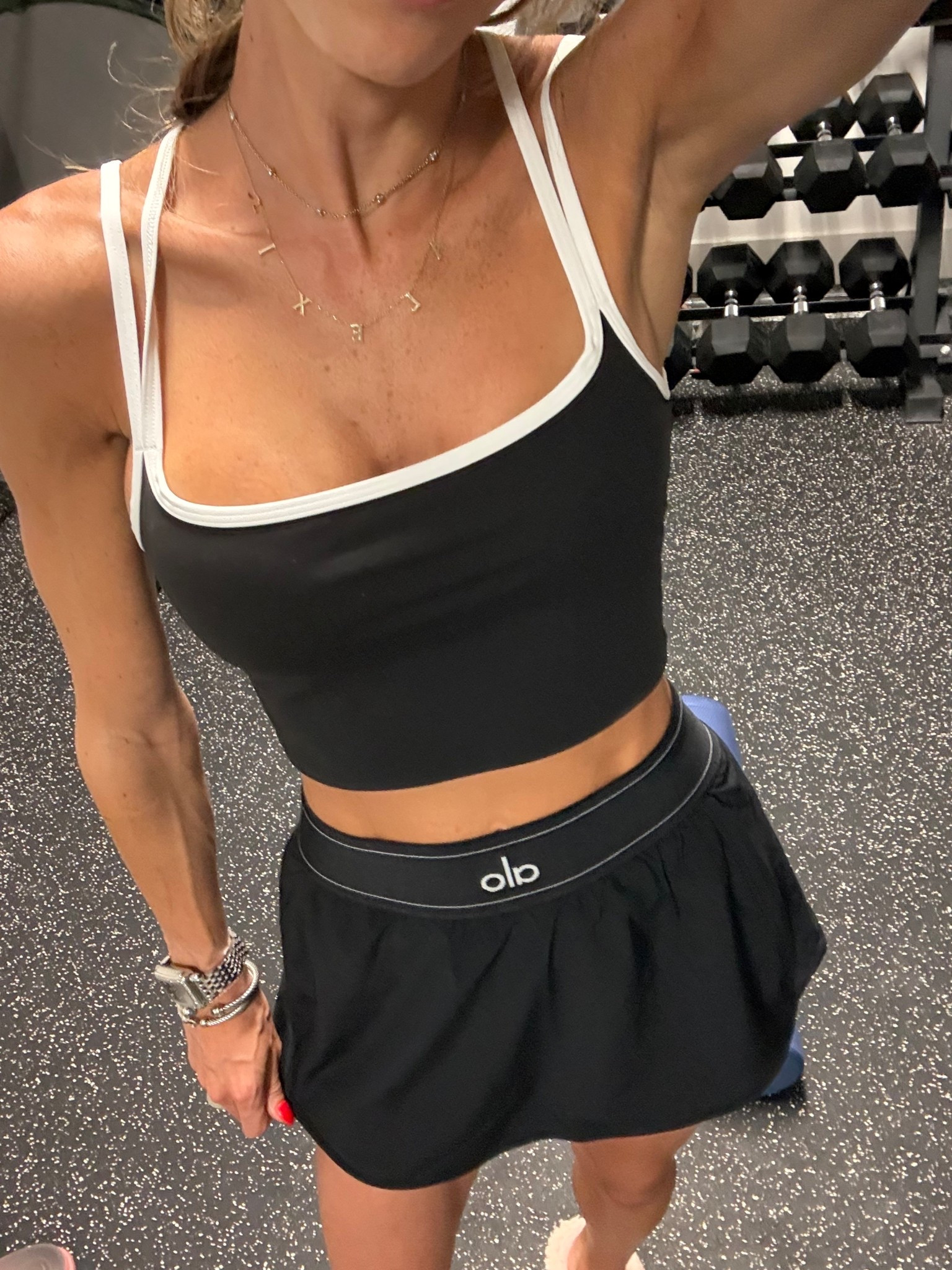 Black and white strappy tank back in stock! Size xs with alo tennis skirt size xs 

#LTKActive #LTKfitnessgoals