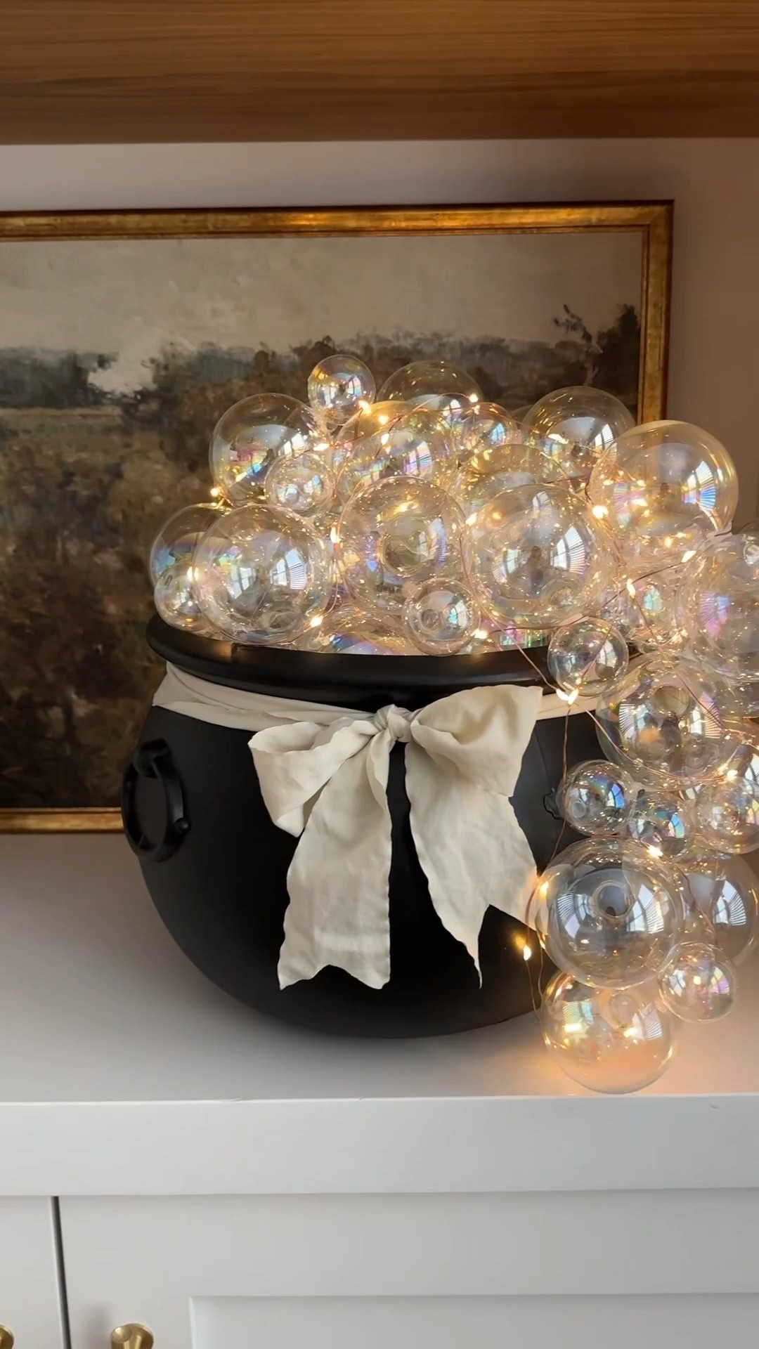 This DIY Cauldron didn’t just bubble… it boiled over. 🫧 So grateful for all the Halloween lovers it brought my way. 🪄🫧🧙🏻 
I’m so glad you’re here 🖤

I used glass ornaments but plastic is a lot easier to store 😉 

#LTKSeasonal #LTKHome #LTKFamily