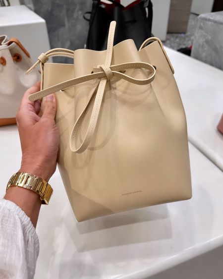 I have this bag in 2 colors - such an easy every day crossbody bag and surprisingly fits a lot! Love this buttery cream color. 

Drawstring
Bucket bag
Weekend
Everyday bag
Butter yellow
Mansur gavriel 
#sakspartner 
#saksteam

#LTKItBag #LTKStyleTip