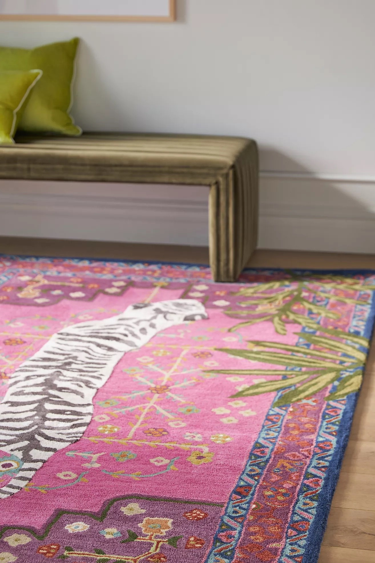Hand Tufted Wool Blend Bengal Tiger Rug

A statement in any space, this wool-blend rug features the curved silhouette of a regal Bengal tiger amidst symmetrical palm leaves.