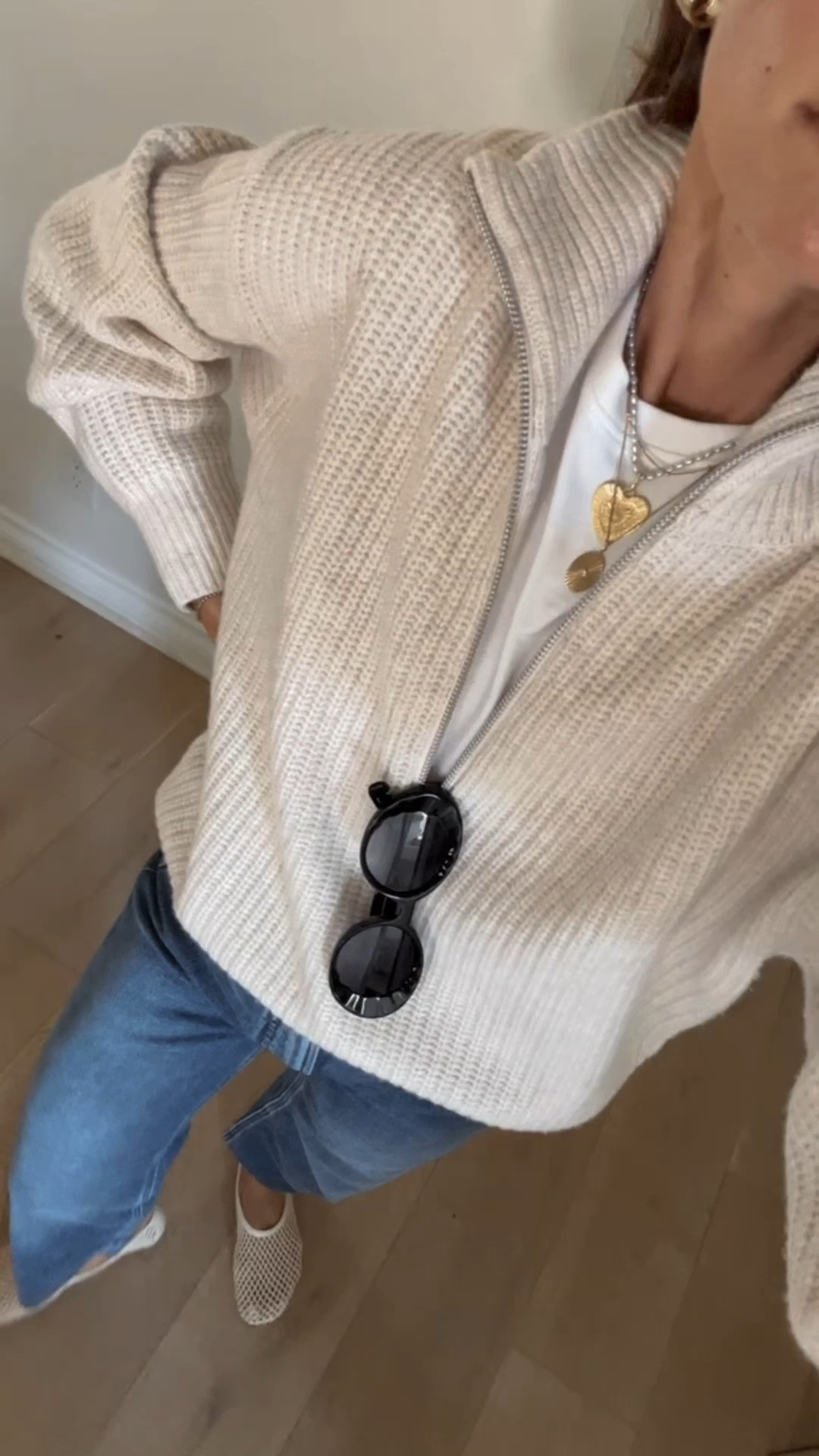 I love this merino felted half zip sweater from @everlane, which I’ve had for 4 years. It feels as if you’re wrapped in a soft and cozy blanket- perfect for end of summer nights and chilly fall days ahead. It has a relaxed fit, and a luxe look and feel to it (I don't find it to be itchy at all). Perfect layered over a tee, or under a coat depending on the weather. The fit is naturally oversized, and I am wearing my regular brand size (XS). It comes in 5 other color options as well (all so beautiful!). #everlanepartner 

#LTKOver40