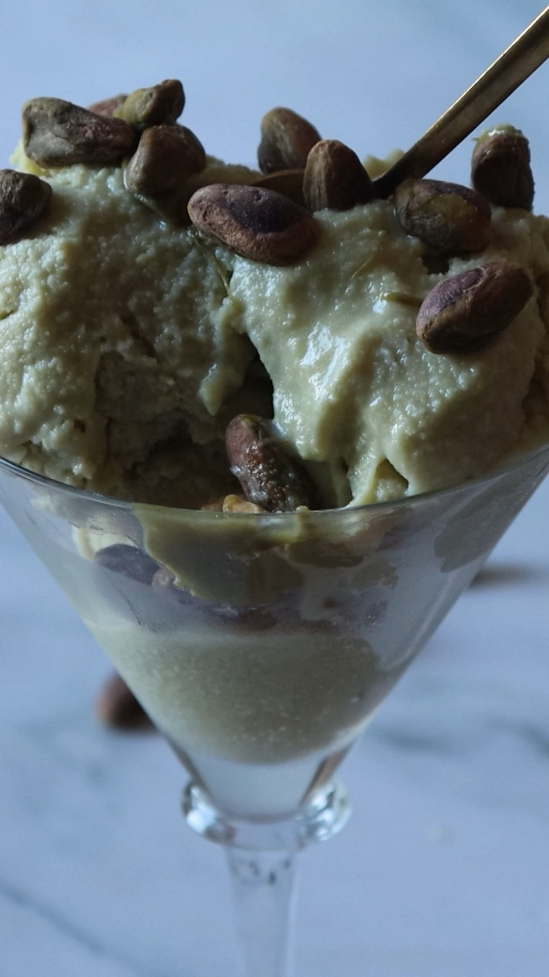 Homemade ice cream is my summer job, and I use two different machines to do it 🍨 The Ninja CREAMi spins a chilled base into scoopable soft serve in about two minutes, no ice, no waiting, and the KitchenAid attachment turns the stand mixer already on my counter into an ice cream maker for a fraction of the price. Both make the pistachio ice cream in this video beautifully, and the choice comes down to counter space and budget. My warm base of cream, white chocolate, and pistachio spread cools overnight either way, then either machine takes it from there. The full recipe is on At the Immigrant's Table, and every tool I used is linked below!

I'm Ksenia, food blogger and mom of two, and every summer starts with a fresh batch of this in the freezer. Follow for more!

#pistachioicecream #homemadeicecream #creami #kitchenaid #summerdesserts #immigrantstable

#LTKfoodie #LTKHome #LTKstorytime