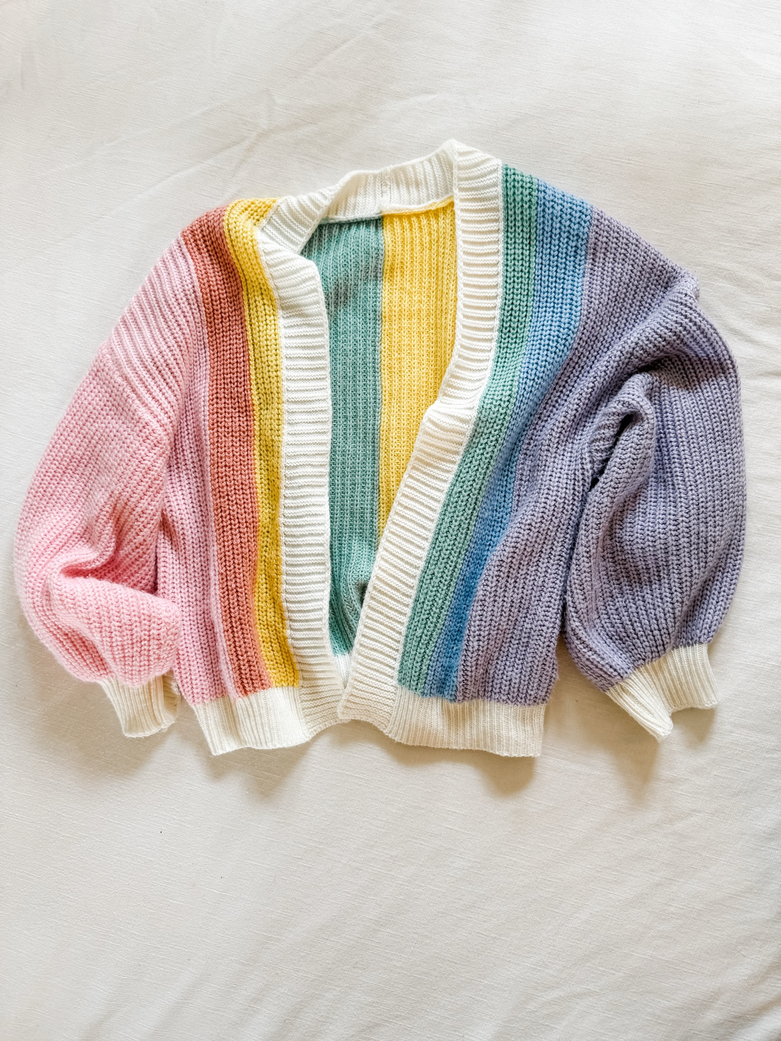 This cardigan is giving all the bright spring vibes and gets compliments every single time I wear it. It’s such a fun piece to throw on with jeans, leggings, or even over a simple dress.

#LTKootd #LTKSeasonal #LTKmomlife