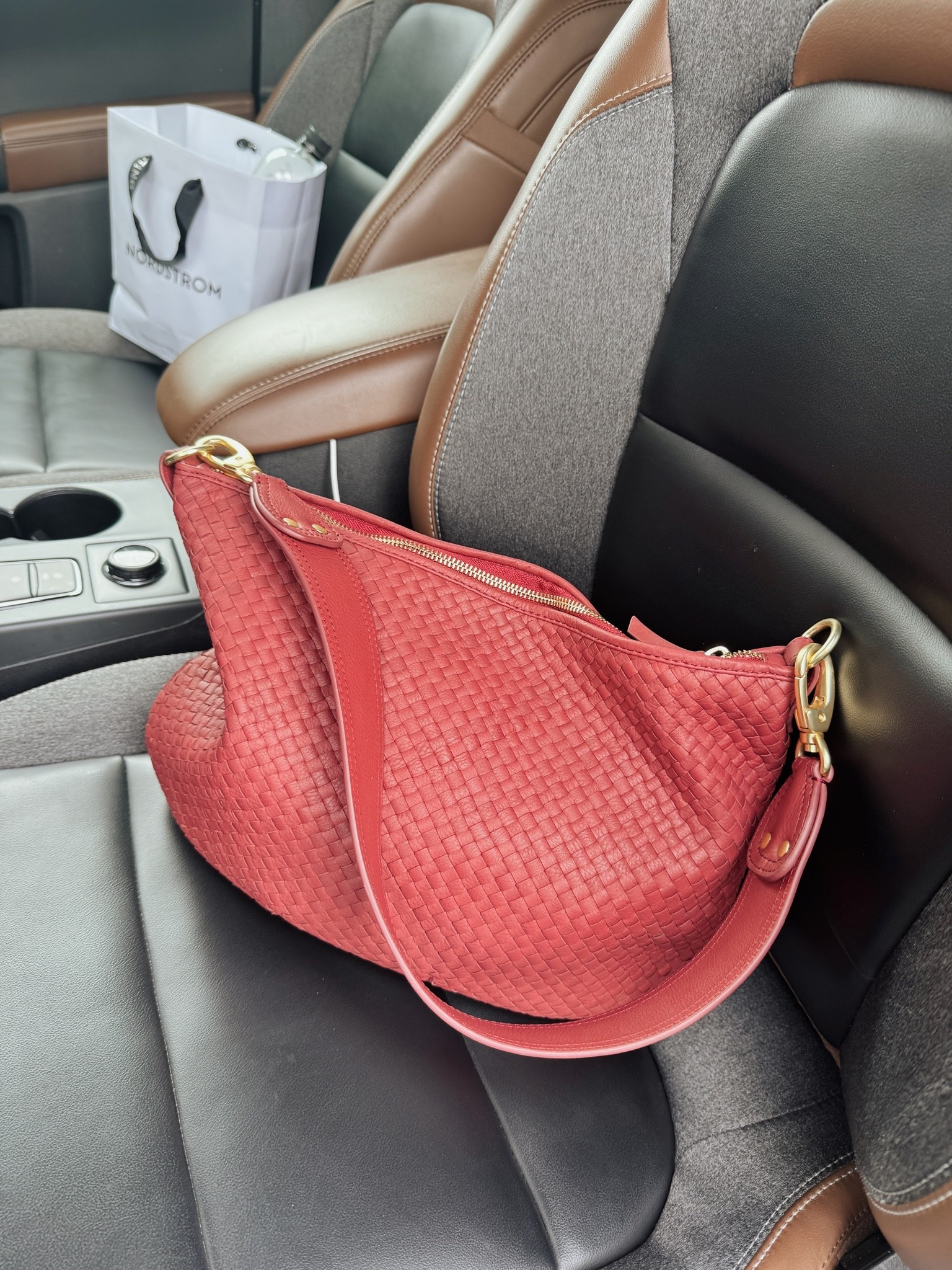 This bag fits my small laptop and I love the color for this season.