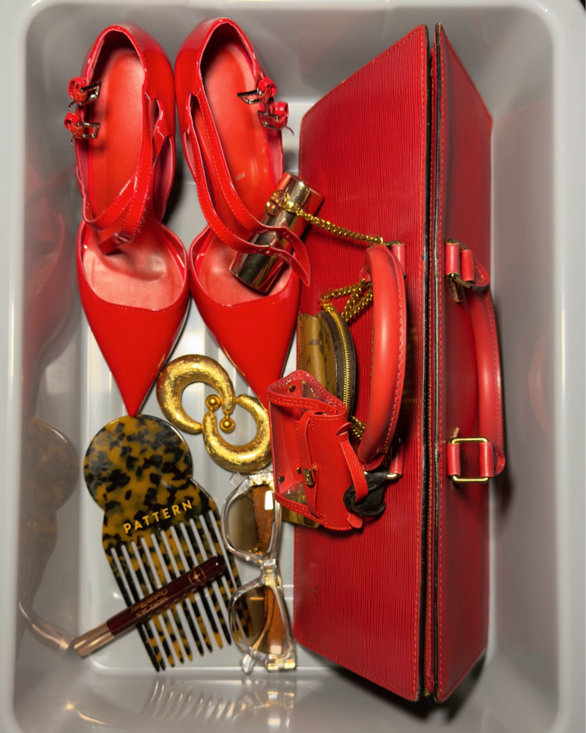 Trending accessories that I am loving… these patent leather red pumps and east west epi leather Louis Vuitton Bag are perfection. Some of my other essentials are a good scent and my Pattern beauty pick. 

#LTKItBag #LTKBeauty