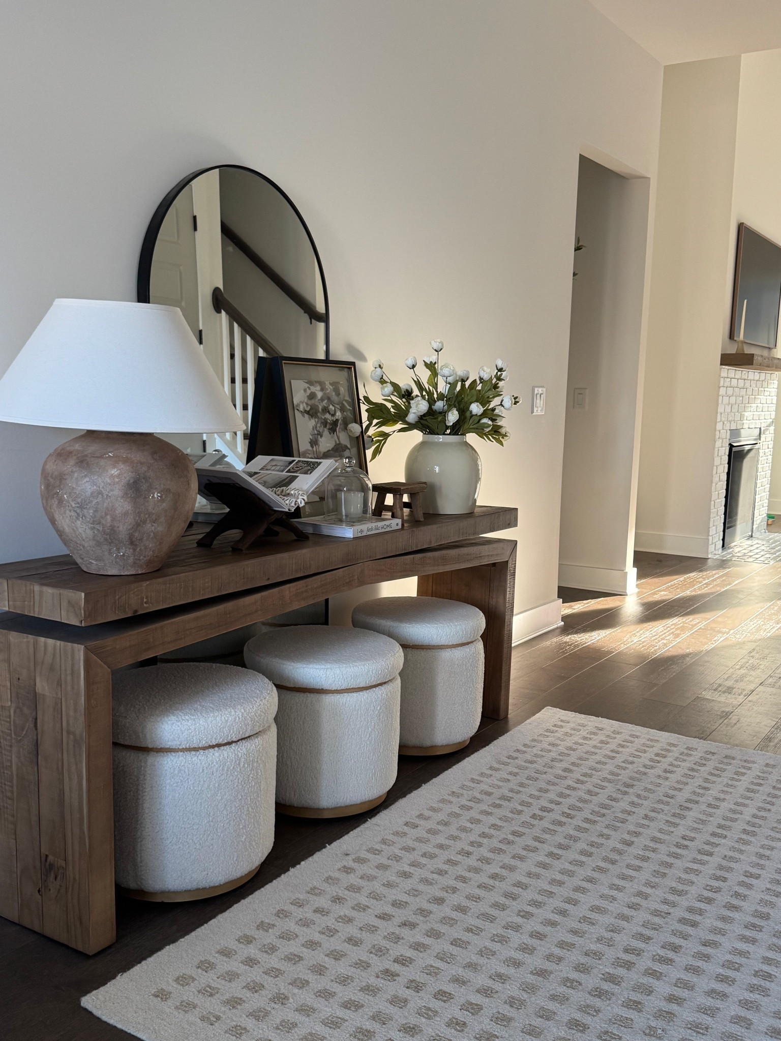 Cozy and affordable entryway decor from @Wayfair! I love how inviting and put together this space feels for spring! #ad #WayfairPartner #Wayfair 

#LTKSaleAlert #LTKHome #LTKFindsUnder100