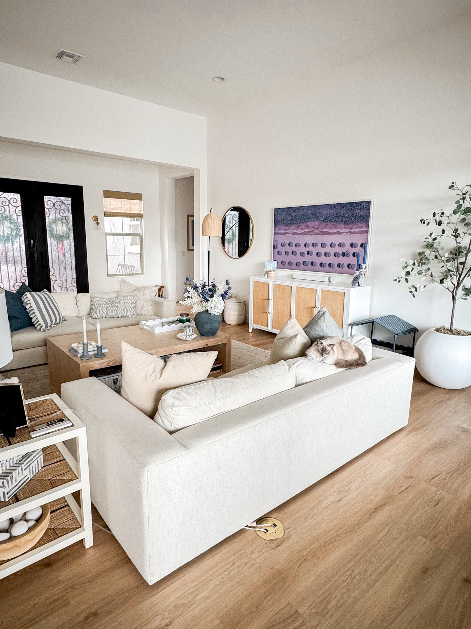 And just like that, our living room is refreshed for the new year! Coastal vibes are back! Decor, home decor, pottery barn, blue decor 