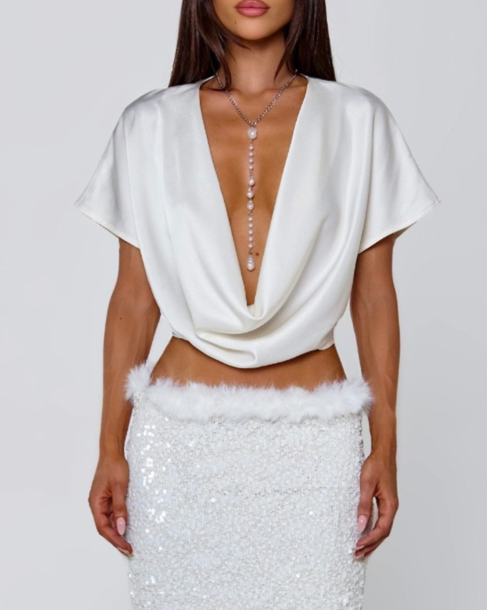 Shop this chic and classy deep scoop neck top from outcast. 

#LTKootd #LTKCyberWeek #LTKU