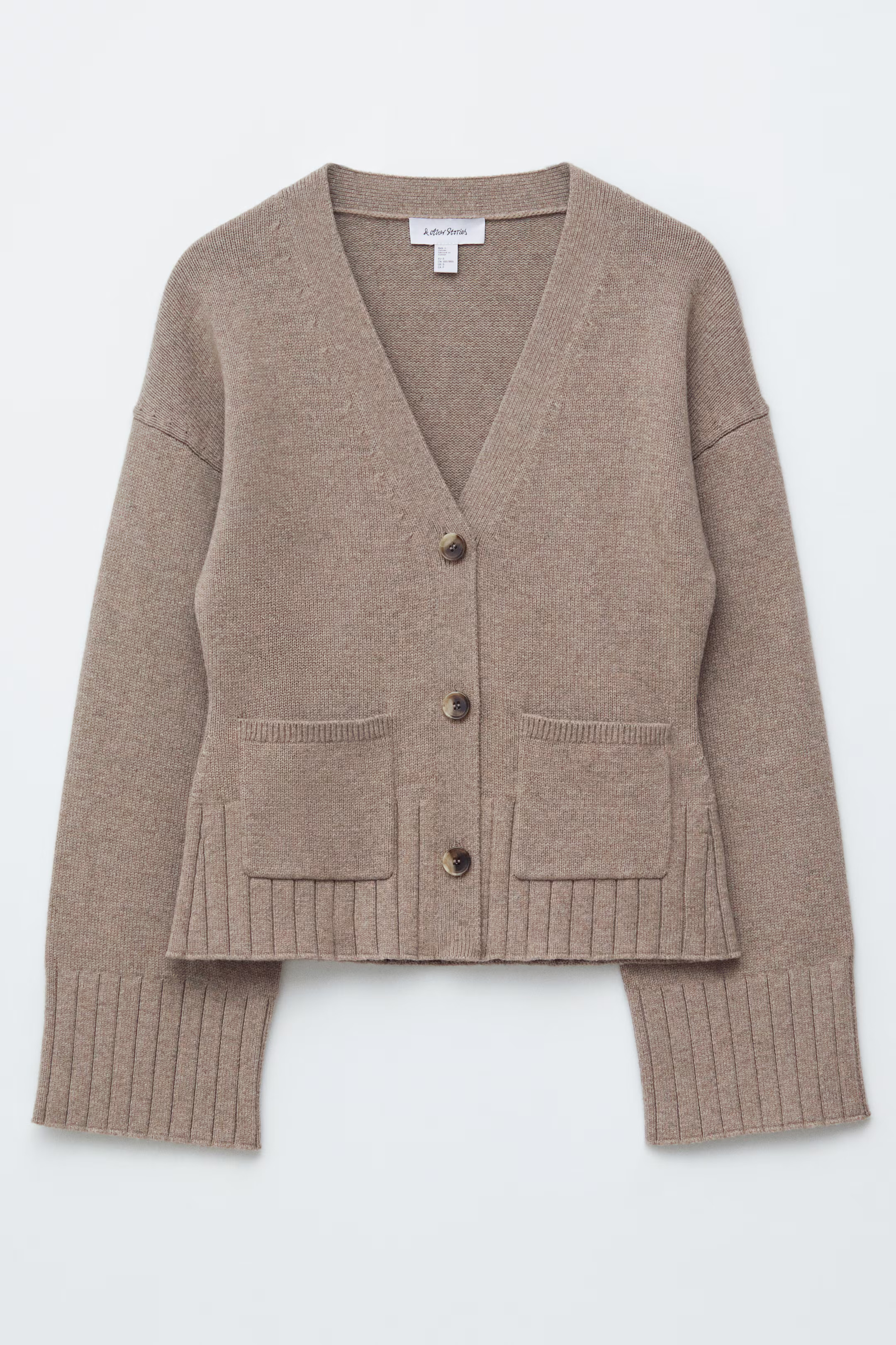 Schmal zulaufende Strickjacke | H&M (DE, AT, CH, NL, FI)