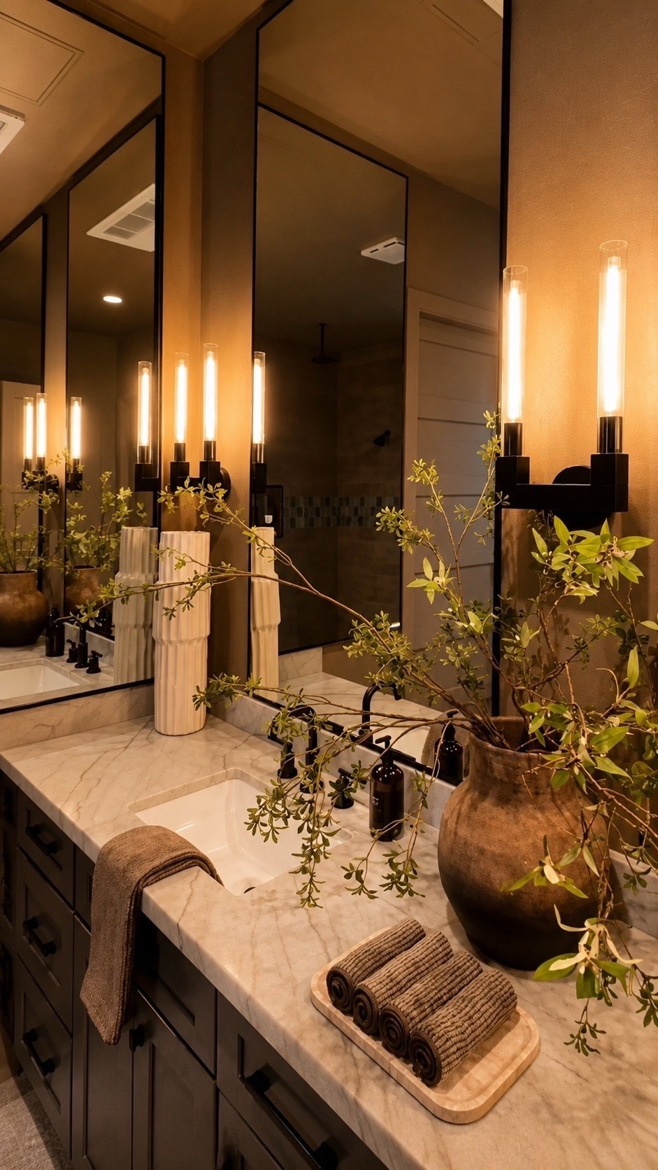 This bathroom is absolutely stunning and so easy to recreate. Elevate the entire space with elongated vases, refined sconces, and warm neutral accents that add depth, softness, and an effortlessly curated feel. 


Summerthompsonstyles

---

elongated vases bathroom sconces neutral accents chic bathroom modern decor elevated styling home inspiration neutral aesthetic 
Light

#LTKHome #LTKdayinmylife #LTKselfcare
