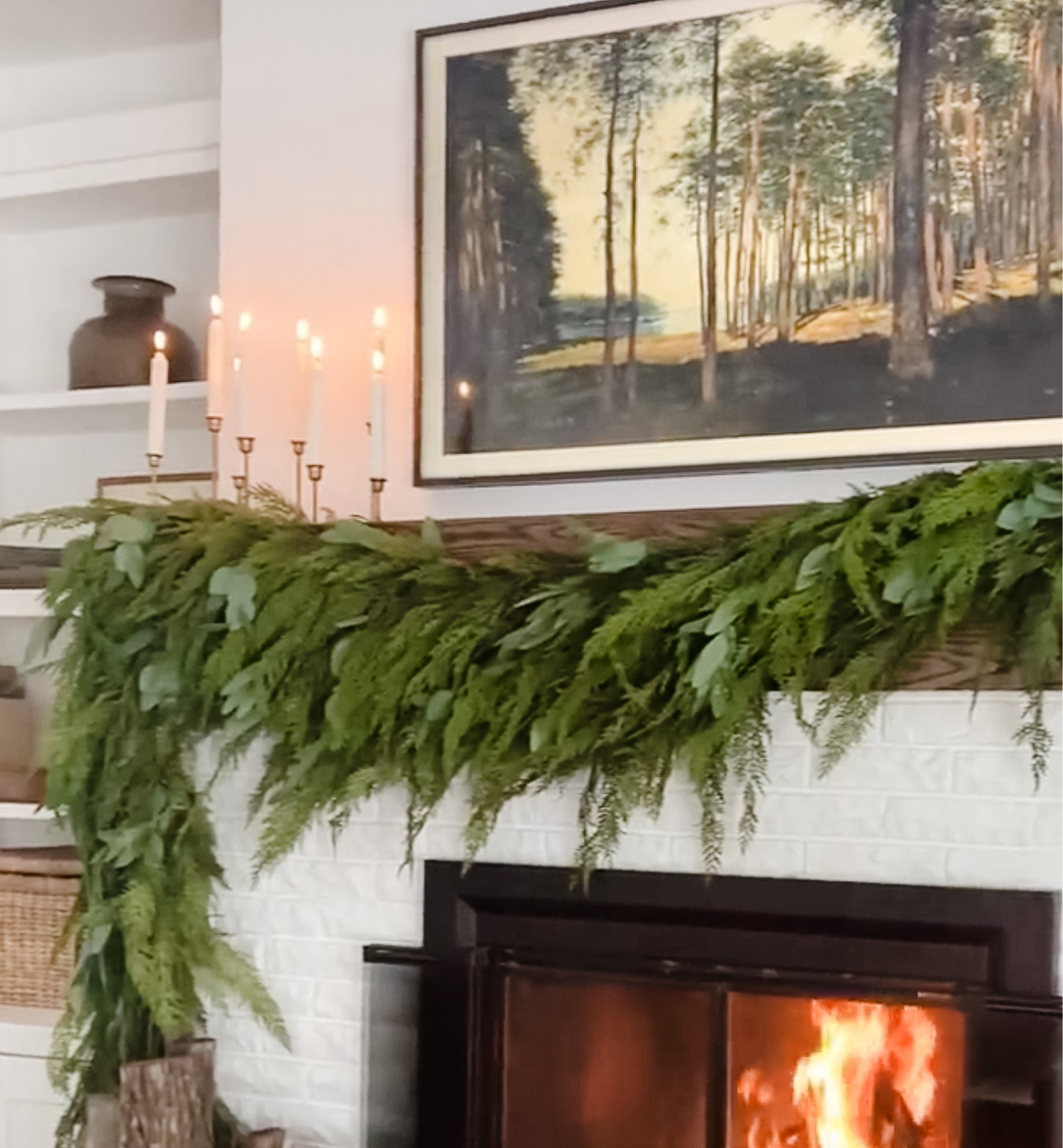 I layered multiple faux cedar garland strands to make this beautiful a symmetrical mantle garland! 

#LTKhome #LTKSeasonal #LTKHoliday