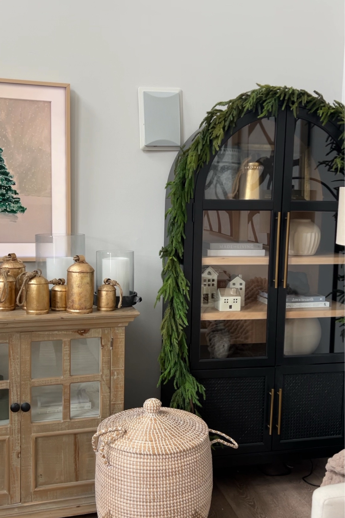 Bookcase cabinet holiday decor, Christmas decor, afloral garland, bells, amazon holiday

#LTKHome #LTKSeasonal #LTKHoliday