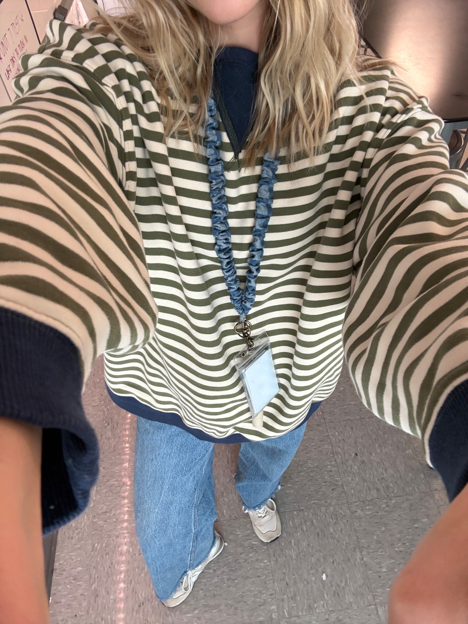 My crewneck is hiding the hair tie that is holding my jeans together over my little baby bump 🤪

#LTKBump #LTKWorkwear #LTKootd