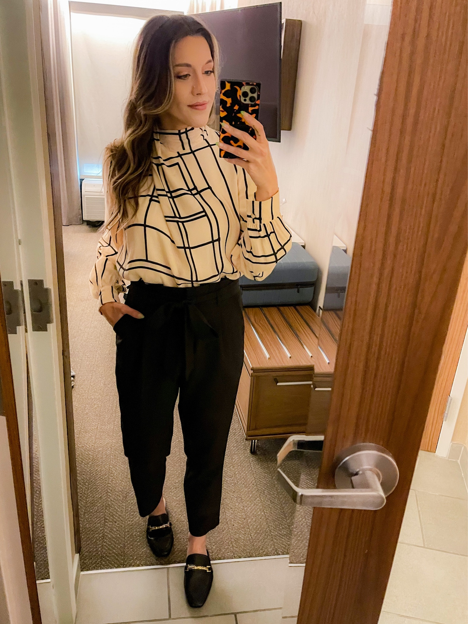 Traveling for work again and finally able to dress up! Love this abstract work blouse and these paper bag slacks! I didn’t know I needed a pair of mule loafers so badly - a must y’all!

#LTKworkwear #LTKunder100 #LTKunder50