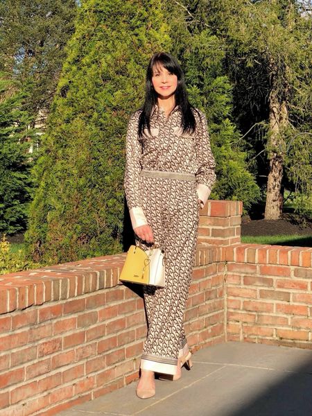 Starting to have some warmer days here, perfect weather for lighter silky, long sleeve jumpsuits! I love this one for its print, flowy material, contrast trim, and loose but not baggy comfortable fit! It can easily go from day to night events with change of shoes and accessories!
