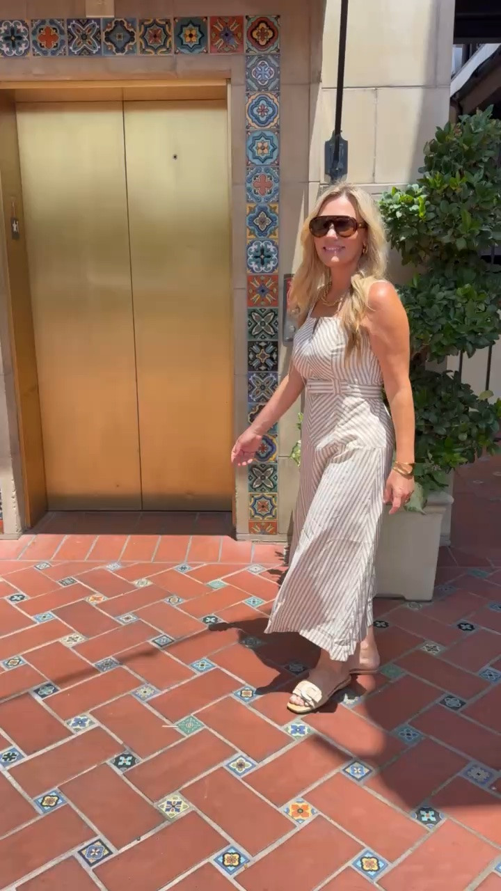 I wore this striped midi dress for a day of walking around and lunch outside, and it was exactly the kind of outfit I needed. The structured neckline and matching belt give it shape, while the lighter skirt keeps it comfortable in the heat. I added flat sandals and oversized sunglasses and never had to think about the outfit again.

Wearing a M
Adjustable straps & removable matching belt

Striped midi dress, belted summer dress, neutral dress, vacation outfit, summer sightseeing look, sleeveless dress, resort style, comfortable summer outfit, lunch outfit, travel fashion, feminine summer style, AudrieDollins

#LTKootd #LTKSeasonal #LTKOver40