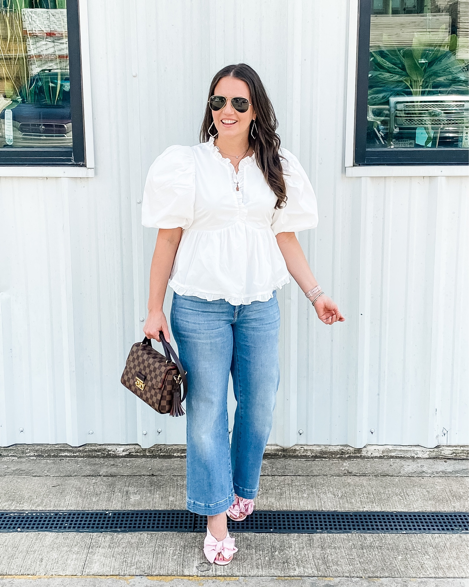 Fall outfits / white blouse / statement sleeve top / perfect top for bride to be / flared cropped jeans great for petite (size down 1) / pink bow heels (size up half) / small satchel purse 

#LTKSeasonal #LTKshoecrush #LTKunder100