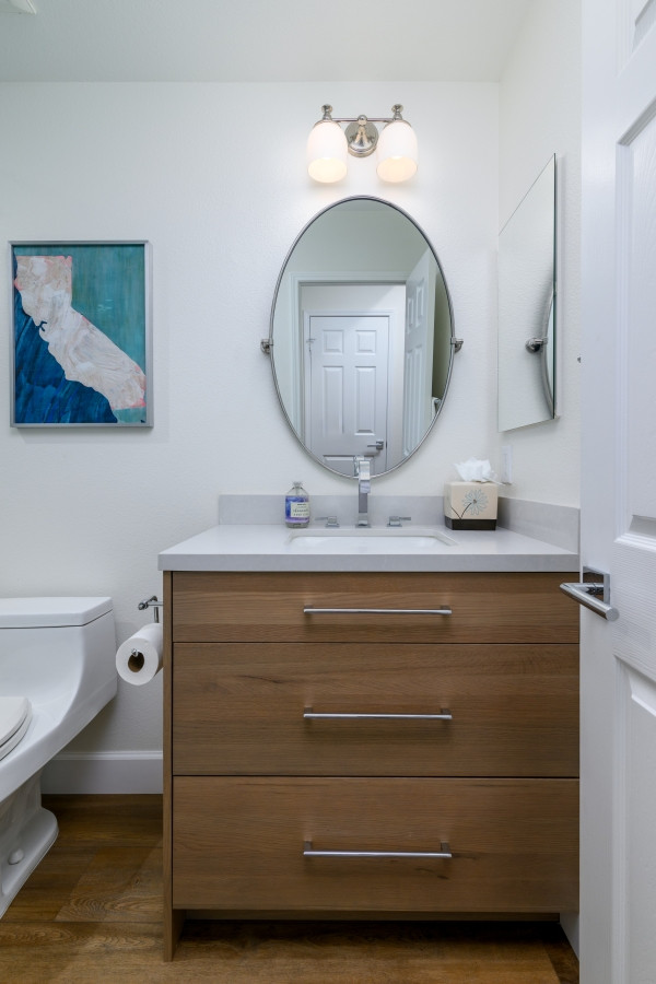 Loving this custom white oak vanity paired with sleek chrome hardware and a modern faucet, creating the perfect balance of functionality and style. The oval mirror and sconce add the finishing touch for a chic, streamlined look. 

#BathroomDesign #CustomVanity #WhiteOak #ChromeHardware #ModernFaucet #BathroomRemodel #HomeInspo #InteriorDesign #VanityGoals #LuxuryBathroom #HomeStyle #ModernBathroom #SconceLighting #BathroomInspiration #DesignBuild #RenovationIdeas #ChicDesign #BathroomMakeover #TimelessDesign #InteriorDetails #HomeDecor #SleekDesign #VanityInspo #ModernInteriors #LuxuryInteriors #DesignInspo #BathroomAccessories 

 #LTKHome