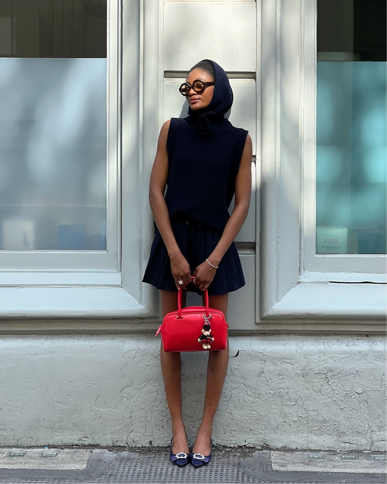 Jacqueline wanted a monochrome navy moment with maximalist detail because basic is boring! So She anchored her @alexgorebrowne_shop sleeveless knit + matching hoodie with a pop of red crochet @scr.tch_ gem (because love, my darlings, is always the answer 💌). Accessorised with her @monsoon kitten heels that was perfect for SUNDAY WAKA WAKA + @jimmyfairly  sunnies. Wasn’t sure what one to wear so she wore both! And of course, her red carryall bowler bag to keep the look playful yet polished. You know… the Jacqueline way.

#JacsStyleJournal Tip:  Elevating minimal pieces (like a vest + pleated skirt) is all in the detail. A pop of colour in your bag, a playful accessory reimagined in a new way and suddenly, simple becomes statement. #Navyblue #Howtowear 

#LTKuk #LTKeurope #LTKstyletip