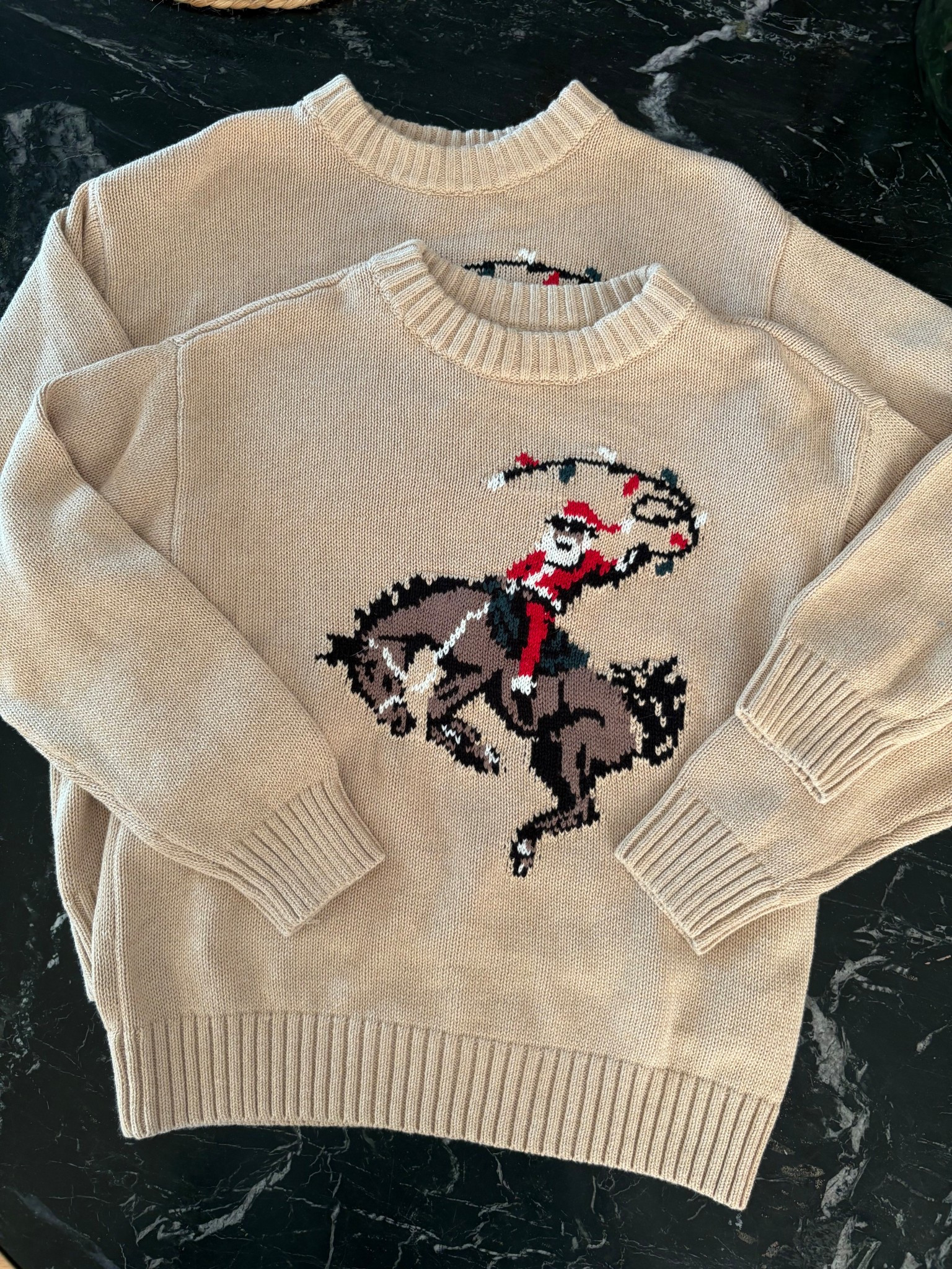 found the cutest Cowboy Santa sweaters for the boys, under $30! Run a tad large I got a size XS for my 6 year old and a size M for my 8 year old. Will be so cute with a flannel layered underneath. 

#LTKFamily #LTKHoliday #LTKFindsUnder50