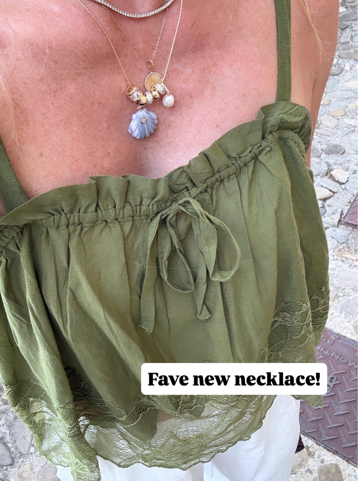 Prettiest new necklace paired with this gorgeous olive green lace tank!￼

#LTKOver40 #LTKootd
