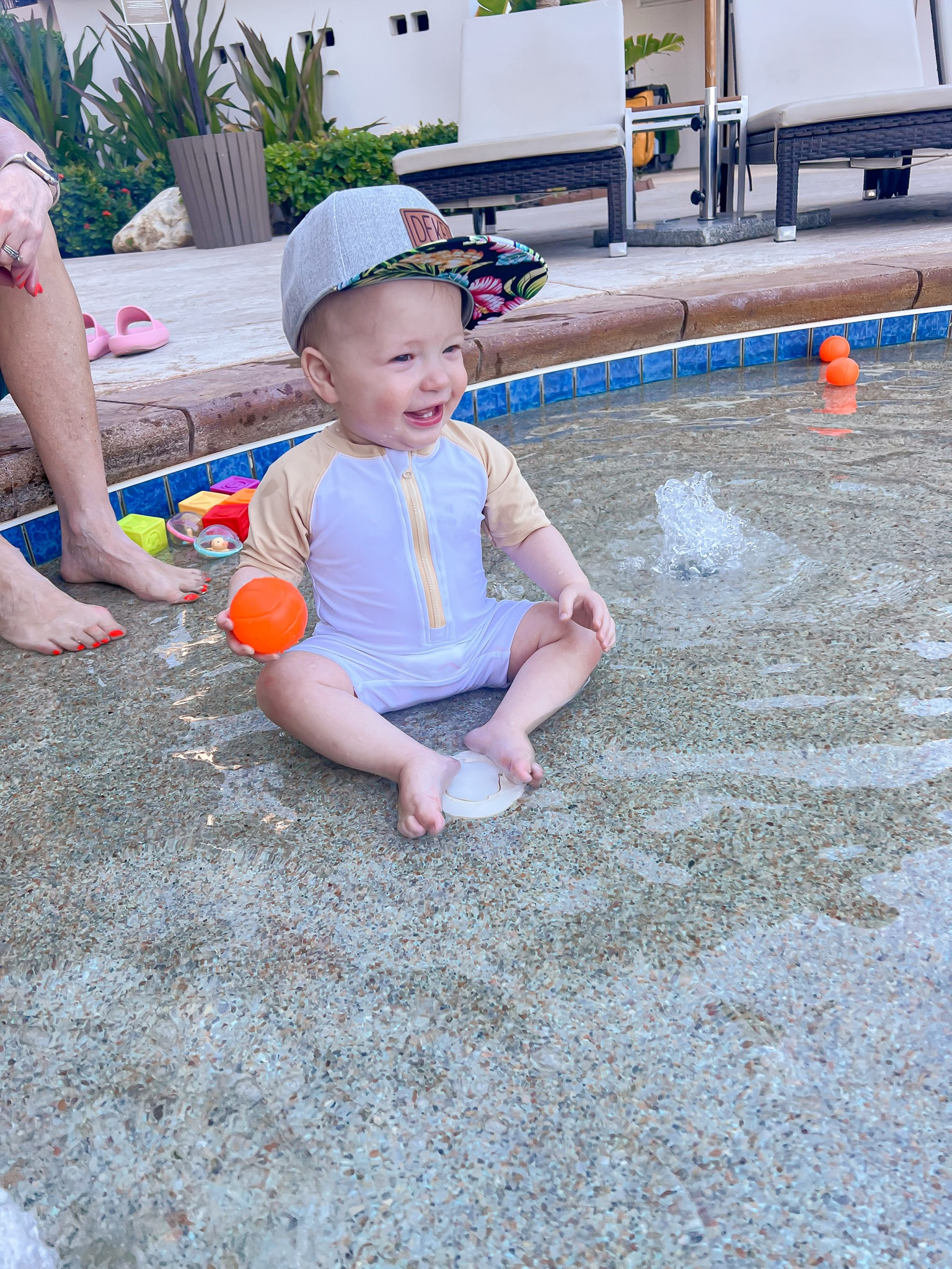 Splash pad all to himself. Happy boy!! 

Loved this swimmer for him! 

#LTKBaby #LTKFamily #LTKTravel