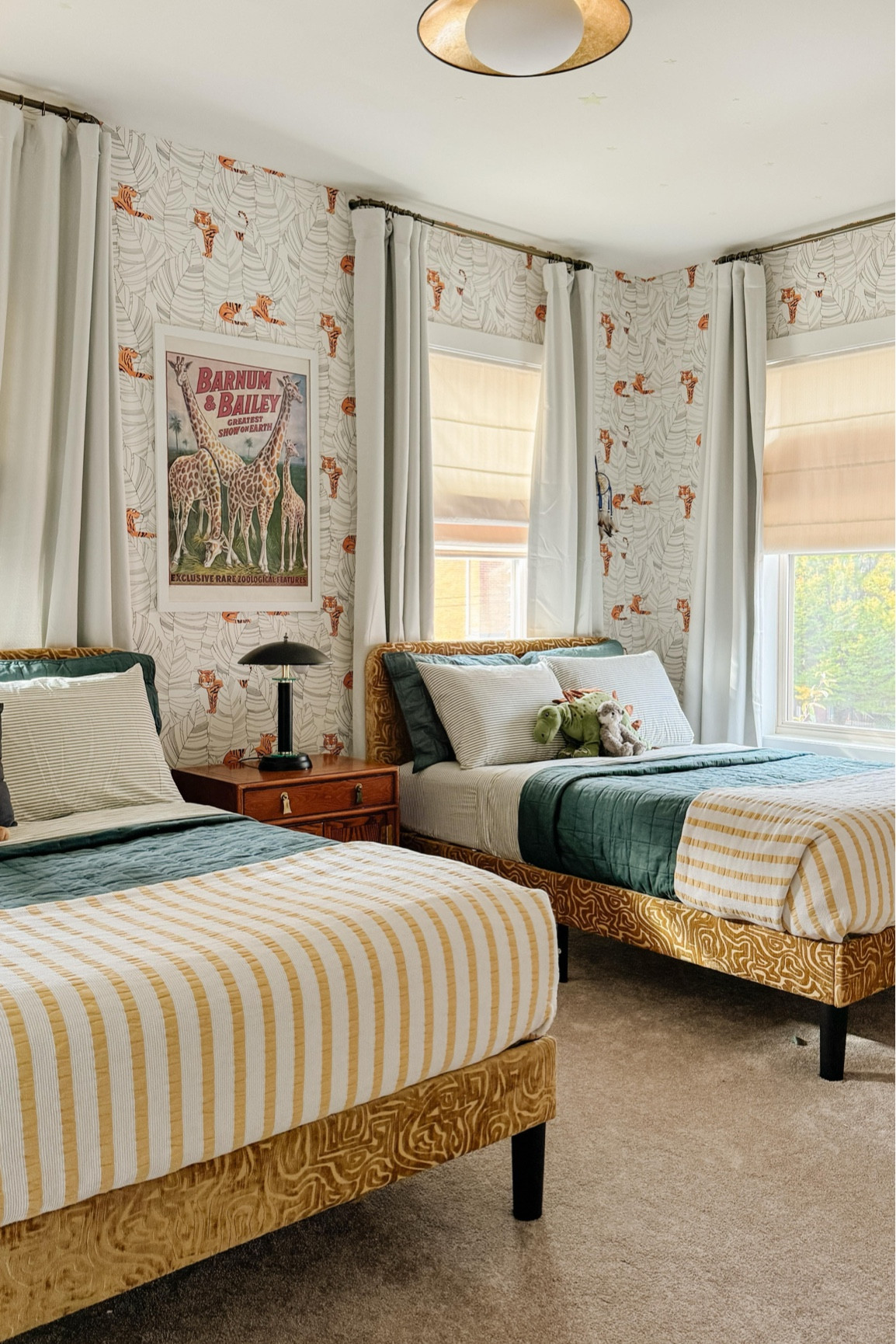 Who remembers those amazing and expensive tent beds? Destroyed. My children absolutely demolished them. Do not recommend.

So.. cheap and indestructible was the name of the game here. Simple beds, upholstered in a fun fabric. A $20 flea market nightstand. And obviously added tons of art from my art collection in a gallery wall for them 😍

Eventually I’ll replace those drab curtains and add a new rug (the last one got thrown up over..) But for now, we’re gonna call this good enough 🙌🏼 



#interiordesign #kidsroom #boysroom #artforyourhome #artforwardinteriors #sodomino

#LTKKids #LTKHome #LTKFamily
