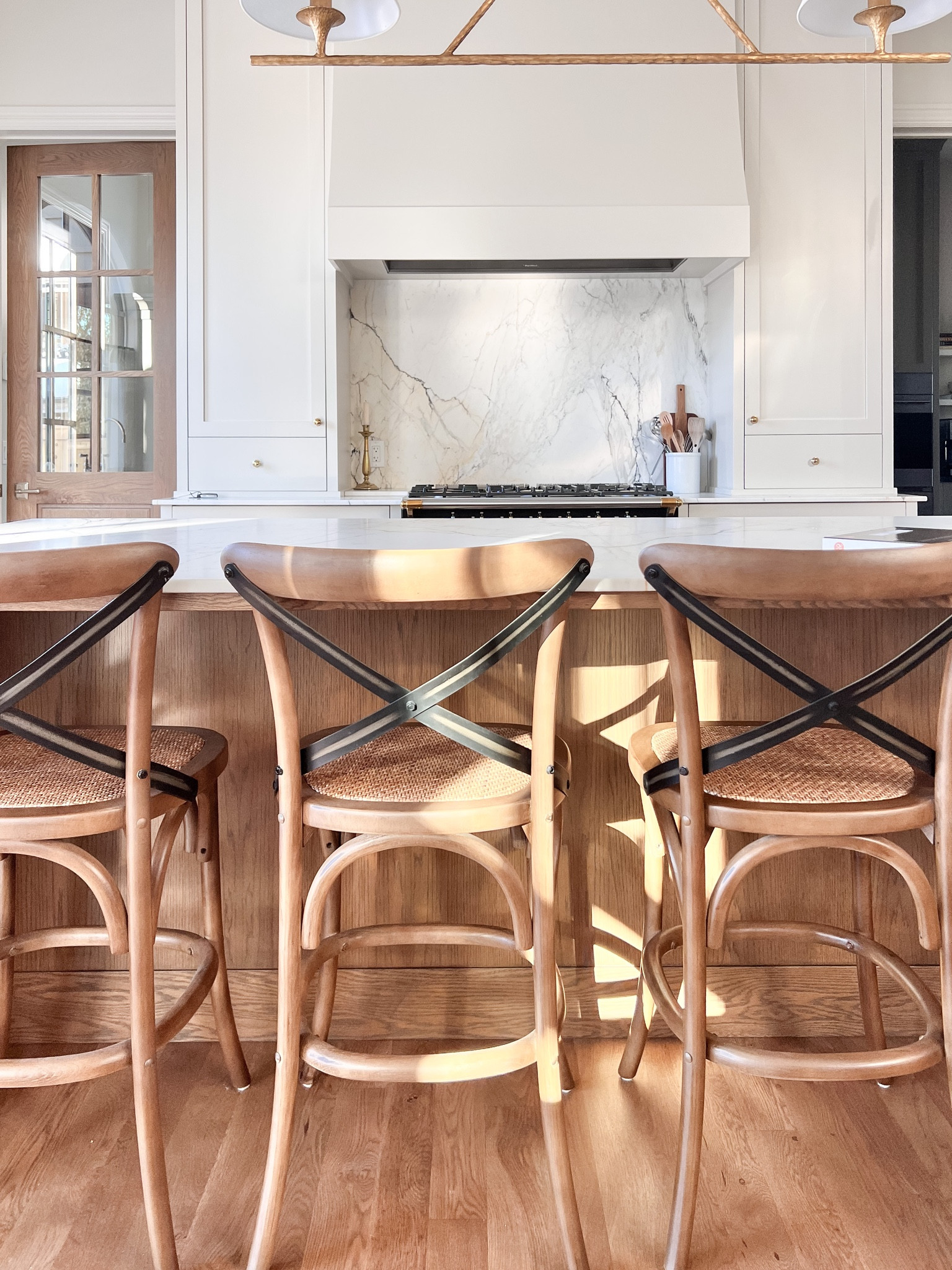 Looking to create a little Parisian moment in your kitchen?? 

We used these beautiful cane and metal stools in a timeless French style to add the perfect amount a casual elegance to this client’s all white and oak kitchen.

The best part!?! I have added something similar here! They are well priced and wipable!! Both must haves for a busy family kitchen.

#LTKhome #LTKstyletip #LTKfamily