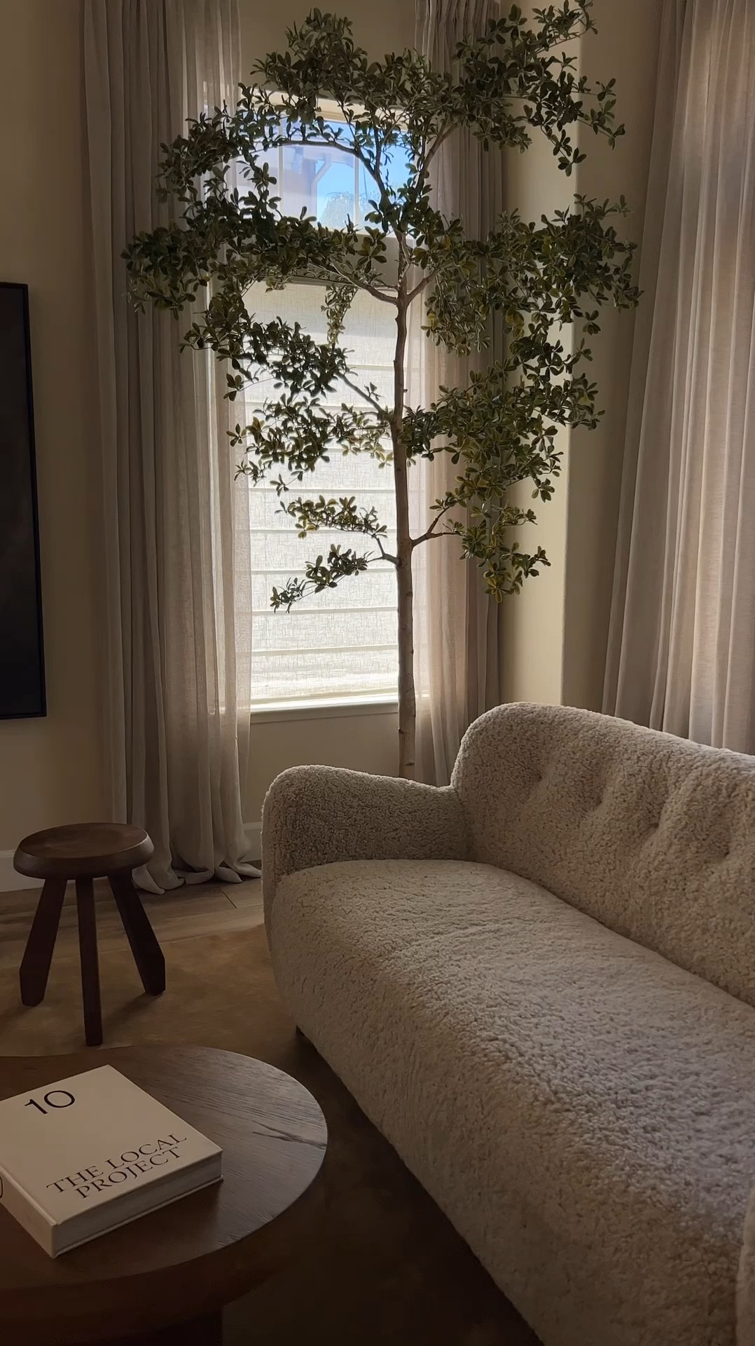 living room links. my tree is a 9ft tree, comes in 4 sizes. sofa is from RH, and rug is from nordic knots (Grand - Chestnut)