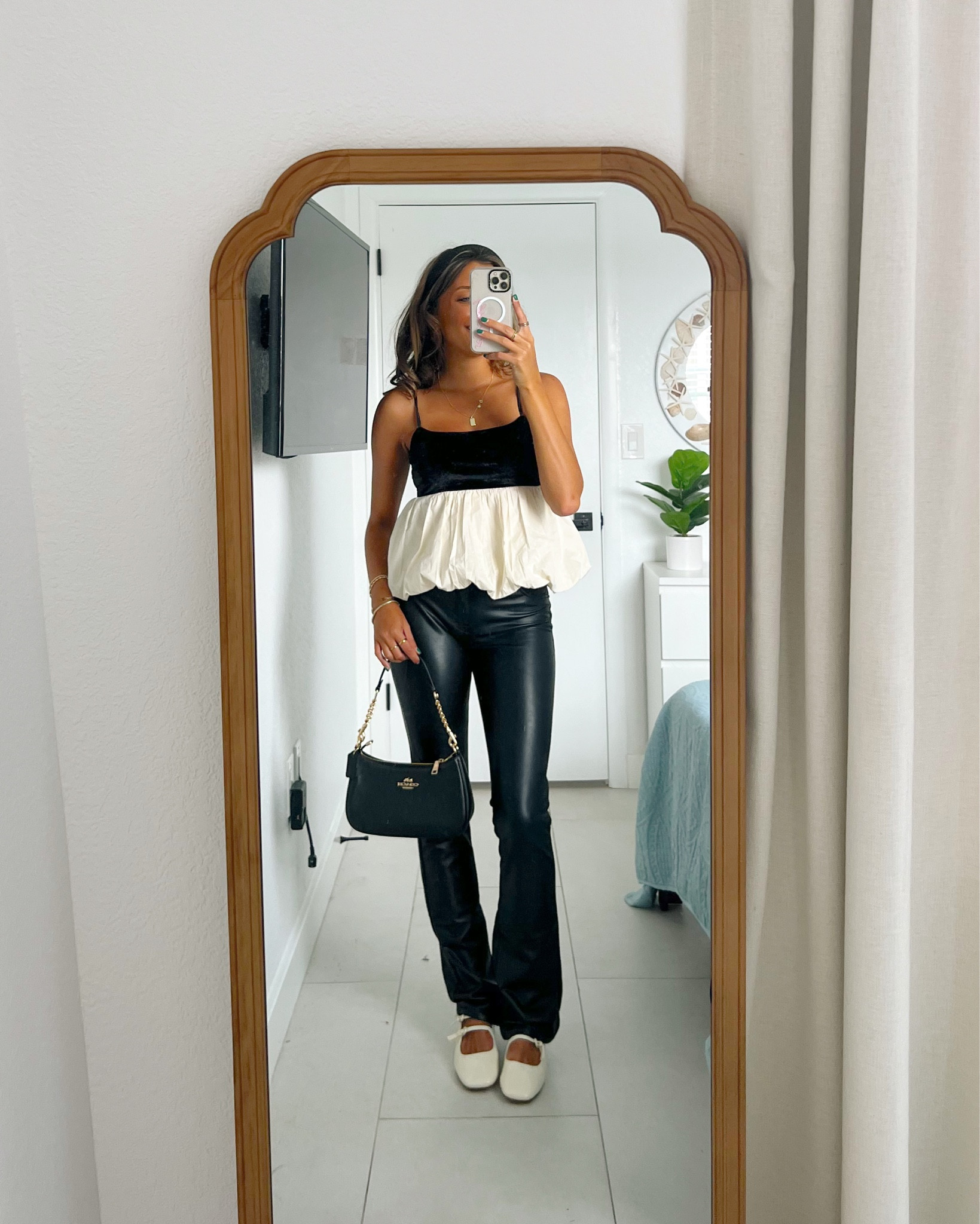 New Year’s Eve outfit ideas from American eagle! Take advantage of their cyber week sale 🪩🥂✨ wearing an XS in this top and 000 regular in the leather pants 

#LTKSeasonal #LTKHoliday