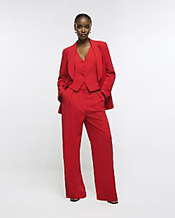 Red pleated wide leg trousers | River Island (UK & IE)