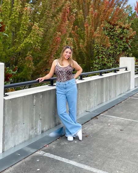 Fall ootd 
Flare jeans long length 
Cheetah bodysuit 
Nike Air Force pixels 

#LTKunder100 #LTKSeasonal #LTKstyletip