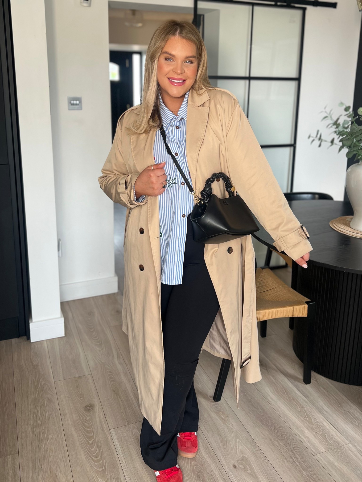 Transitional outfit. Spring outfit. Trench coat. Red adidas spezials. Black flares. Gym flare. Stripe shirt. Ganni bag. Harvey Nichols. ASOS. By Renee. Lovall. Midsize. Maternity style. 

#LTKspring #LTKcurves #LTKmaternity